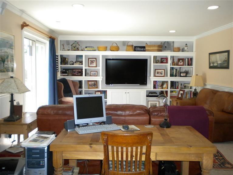 146 Cairn Ridge Road East Falmouth, MA 02536 - Photo 21 of 29 a living room with furniture and a flat screen tv