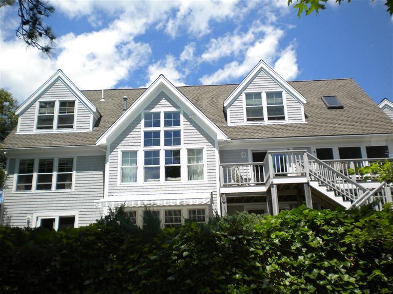 146 Cairn Ridge Road East Falmouth, MA 02536 - Photo 25 of 29 a front view of a house with a yard