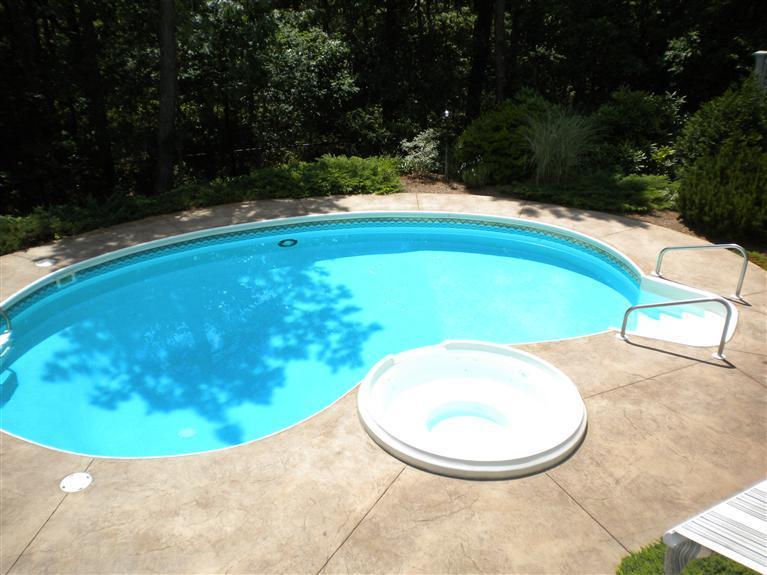 146 Cairn Ridge Road East Falmouth, MA 02536 - Photo 28 of 29 a view of a swimming pool in a backyard
