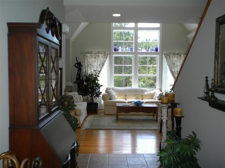 146 Cairn Ridge Road East Falmouth, MA 02536 - Photo 6 of 29 a living room with furniture and a large window