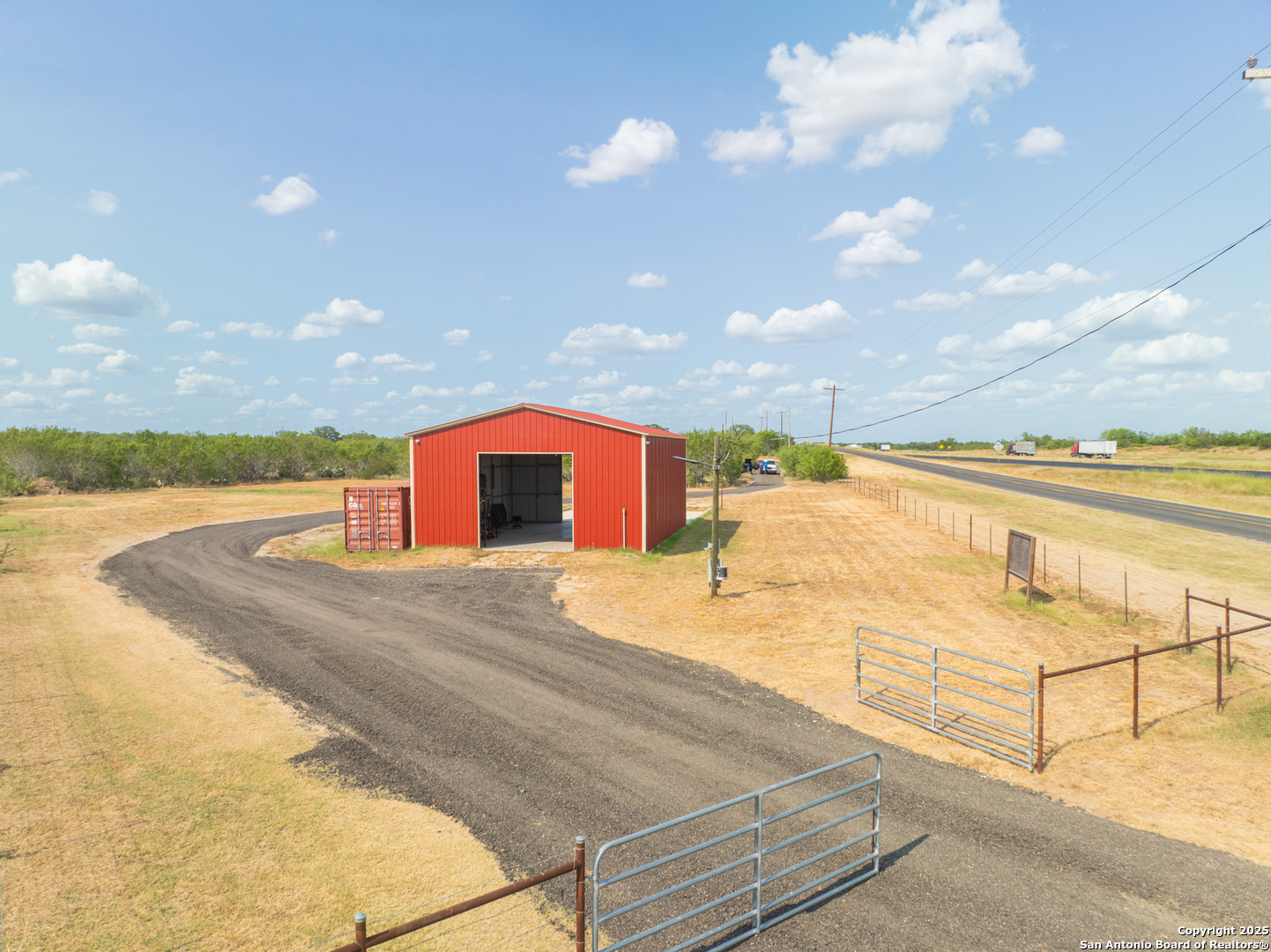14951 Interstate 35 Moore, TX 78057 - Photo 16 of 26 a view of a swimming pool and an outdoor space