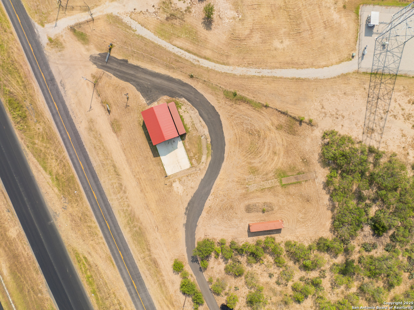 14951 Interstate 35 Moore, TX 78057 - Photo 21 of 26 a bathroom with a bathtub