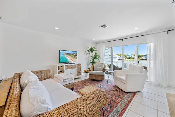 a living room with furniture and a couch