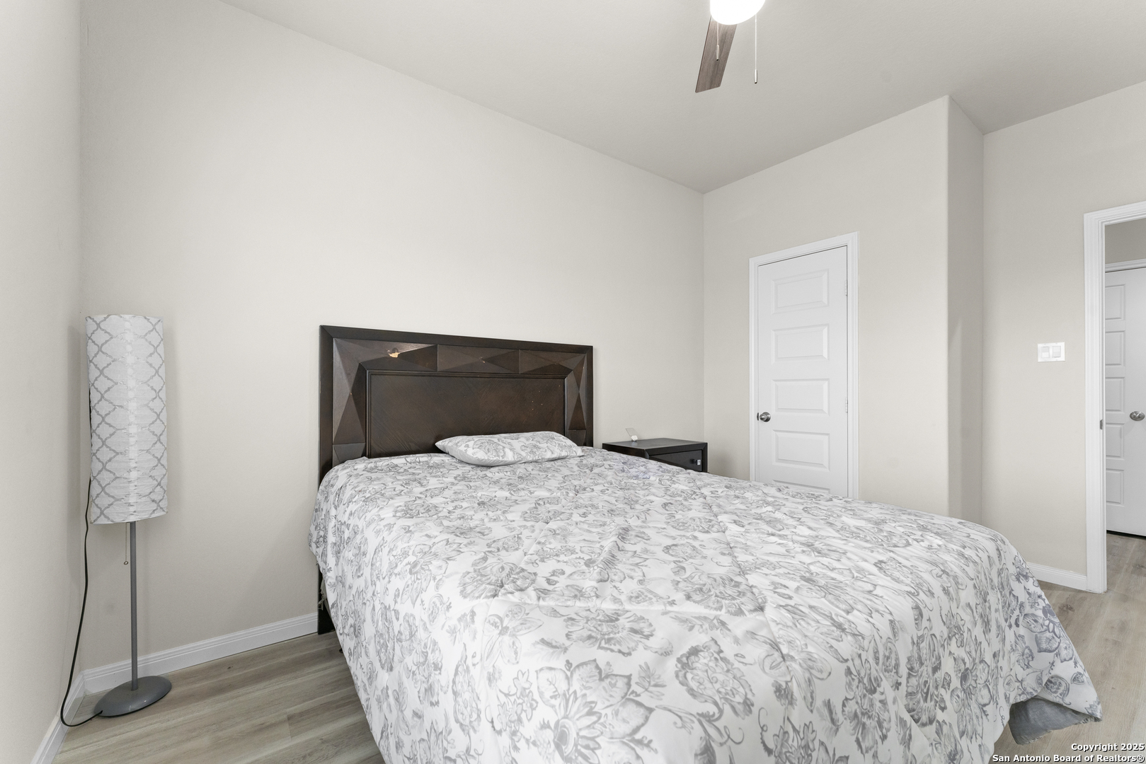 16851 Griffin Road, Unit 2 Atascosa, TX 78002 - Photo 15 of 37 a bedroom with a bed and a window