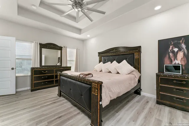 a bathroom with a sink a mirror and a bathtub