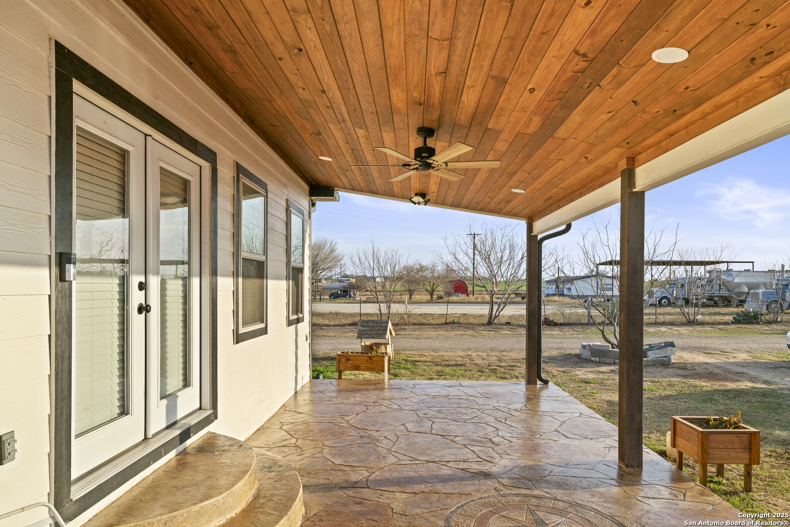 16851 Griffin Road, Unit 2 Atascosa, TX 78002 - Photo 30 of 37 a view of a swimming pool with a porch