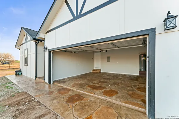 a view of a big room with a fireplace