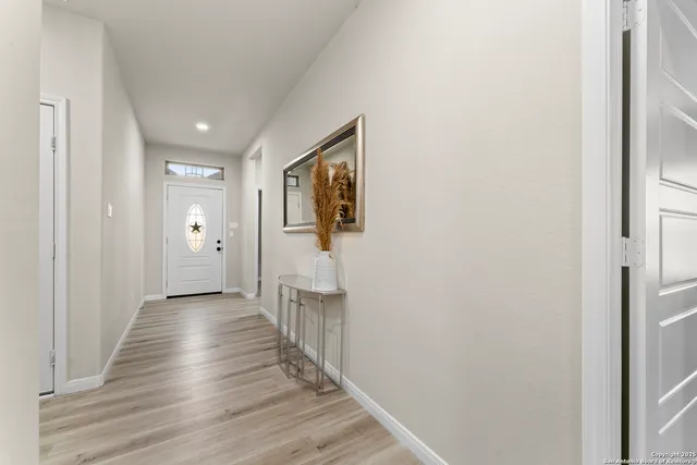 a bedroom with a bed and a tv