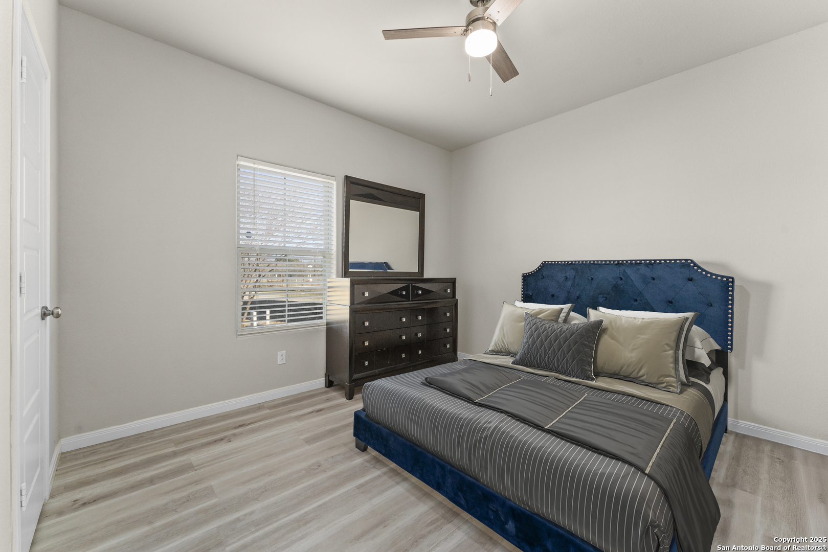 16851 Griffin Road, Unit 2 Atascosa, TX 78002 - Photo 8 of 37 a bedroom with a bed and a tv