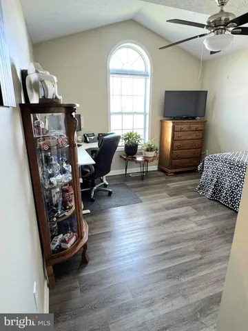 a view of a livingroom with furniture and a fireplace