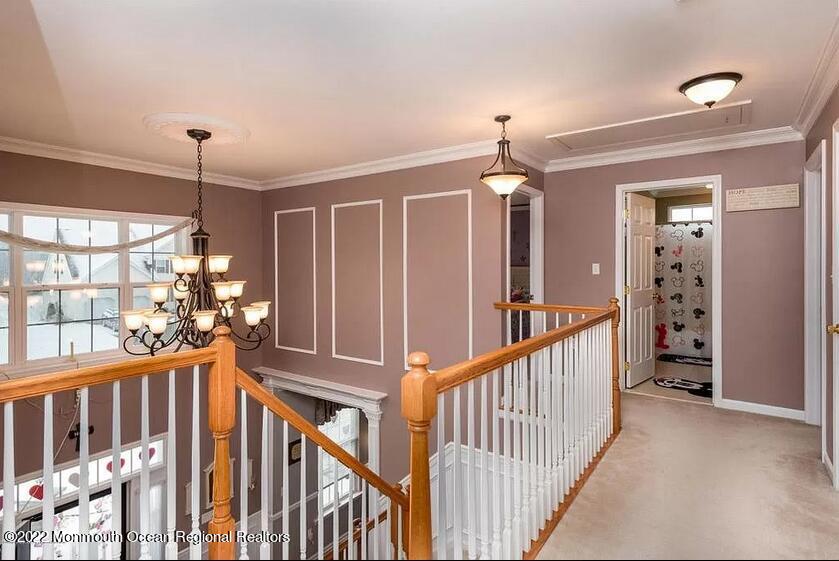 8 Firenze Road Jackson, NJ 08527 - Photo 14 of 23 wooden floor windows and stairs