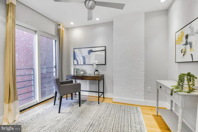 a bathroom with a shower sink and mirror