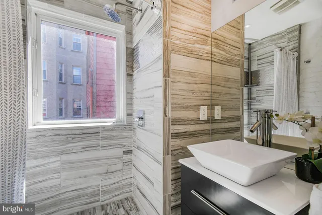 a view of work space with wooden floor and furniture