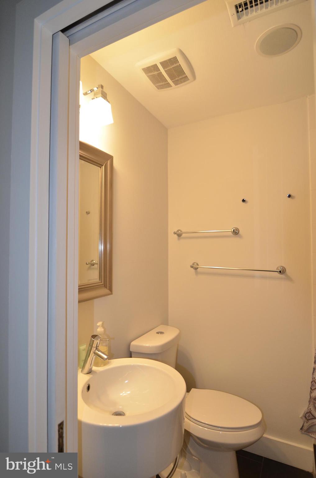 1538 Swann Street Northwest Washington, DC 20009 - Photo 27 of 37 Unit 1 - Front Bedroom Ensuite with Walk-in Shower
