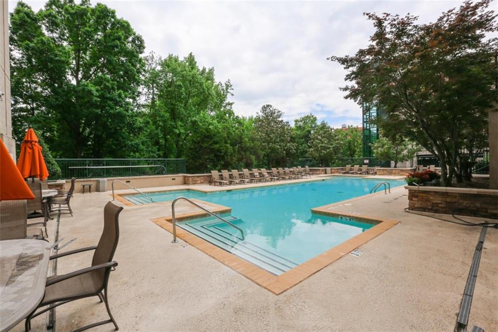 3040 Peachtree Road, Unit 507 Atlanta, GA 30305 - Photo 28 of 33 swimming pool view with a seating space