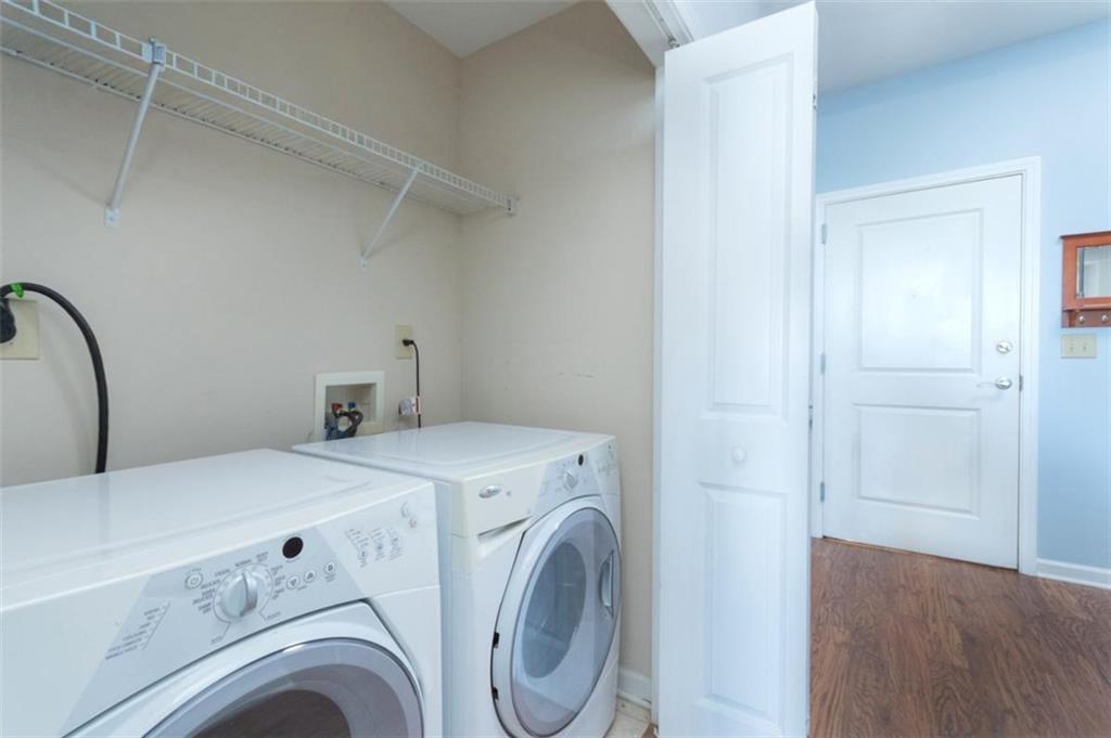 3040 Peachtree Road, Unit 507 Atlanta, GA 30305 - Photo 10 of 33 a utility room with dryer and washer