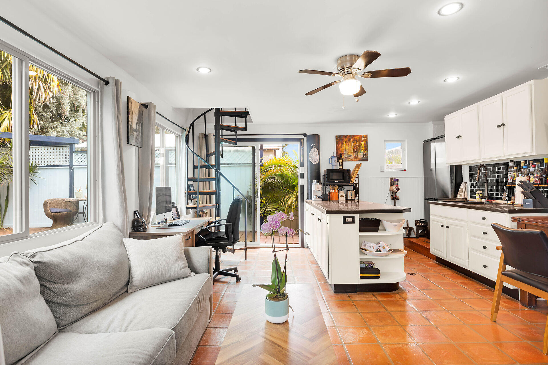 1505 Rose Street Key West, FL 33040 - Photo 43 of 55 a living room with furniture kitchen view and large windows