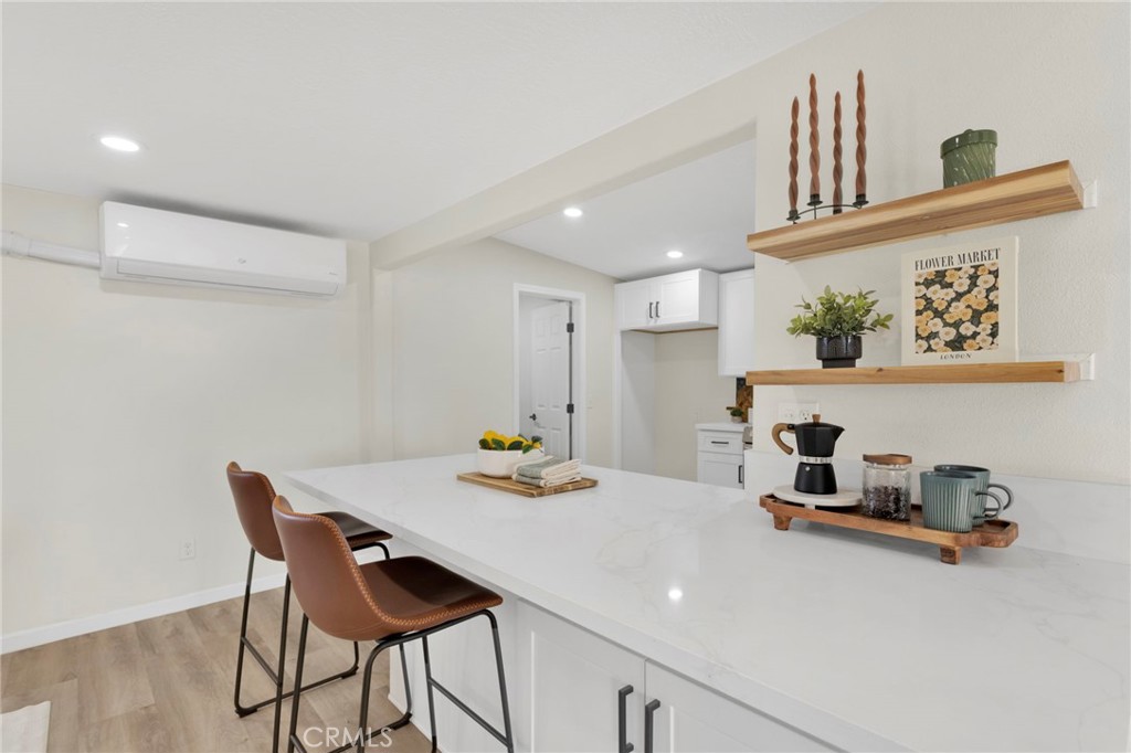 14344 Central Road Apple Valley, CA 92307 - Photo 18 of 61 a kitchen with a table and chairs in it