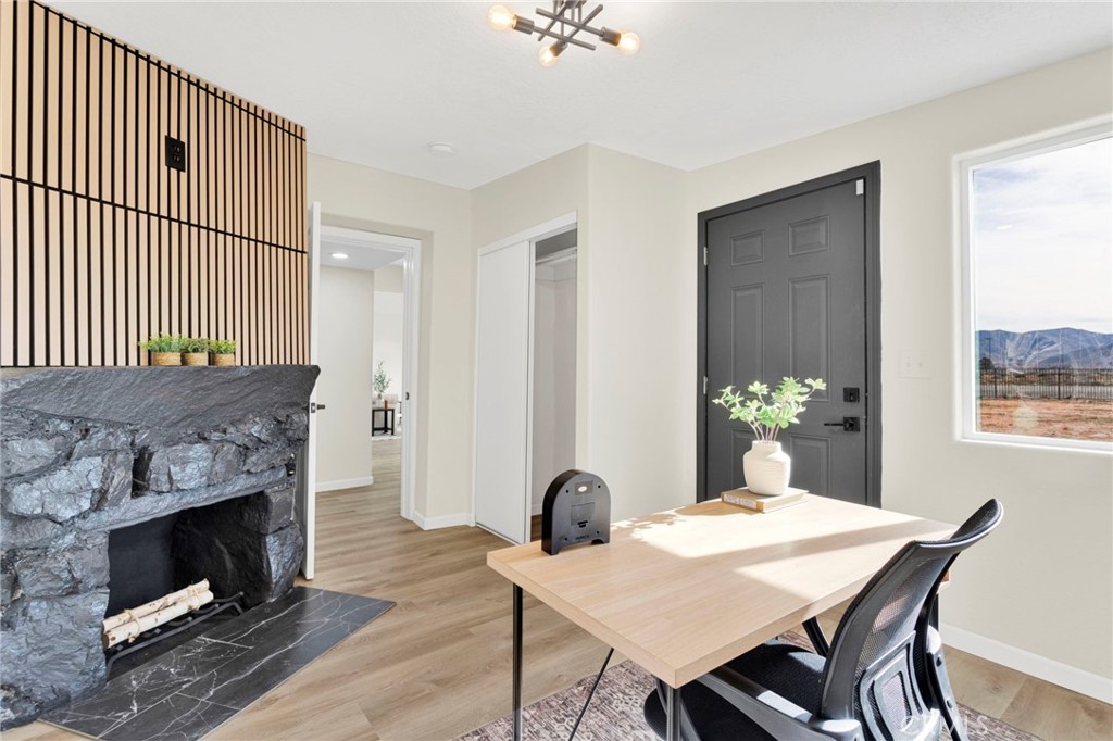 14344 Central Road Apple Valley, CA 92307 - Photo 24 of 61 a view of a dining room with furniture window and wooden floor