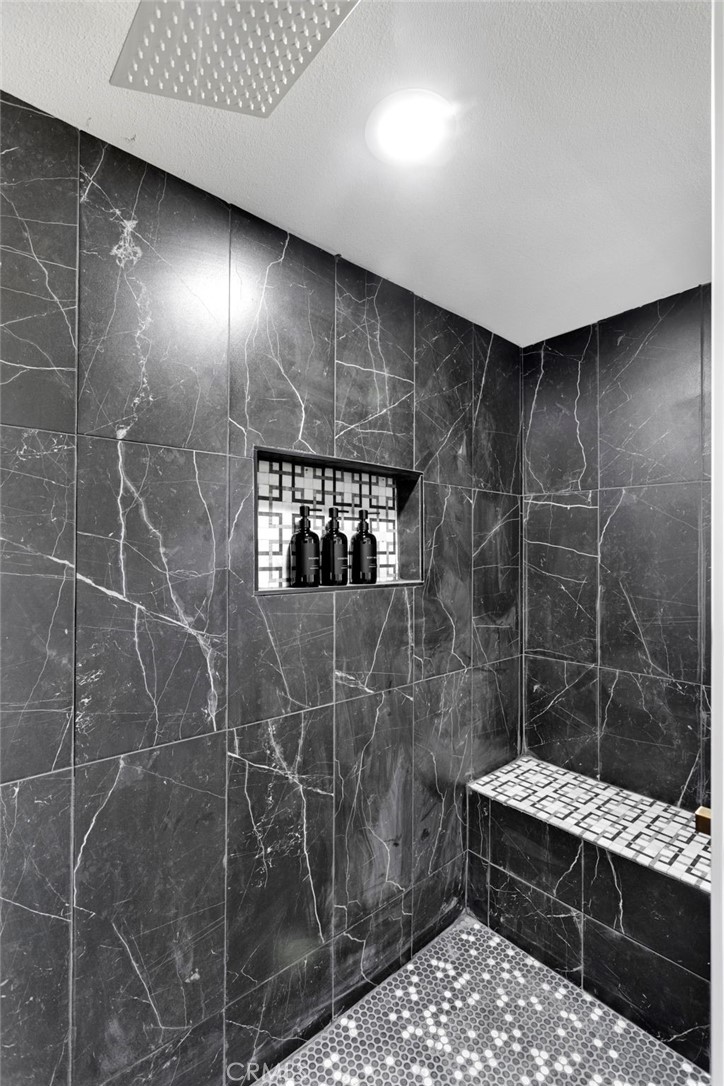 14344 Central Road Apple Valley, CA 92307 - Photo 30 of 61 a bathroom with a toilet a sink and shower