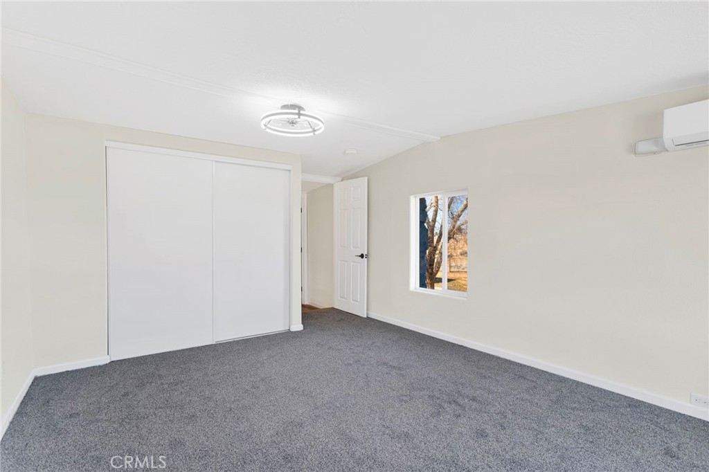 14344 Central Road Apple Valley, CA 92307 - Photo 33 of 61 a view of an empty room with window