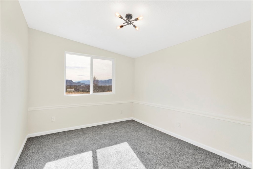 14344 Central Road Apple Valley, CA 92307 - Photo 36 of 61 an empty room with a window