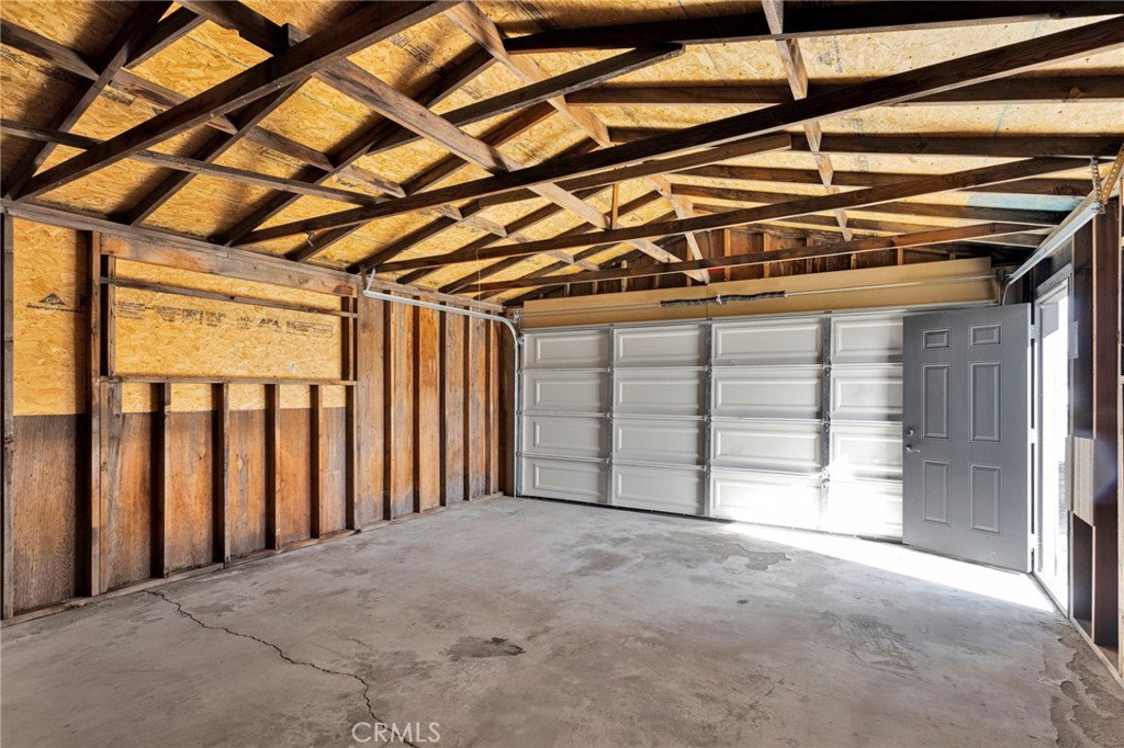 14344 Central Road Apple Valley, CA 92307 - Photo 43 of 61 a view of a room with wooden walls