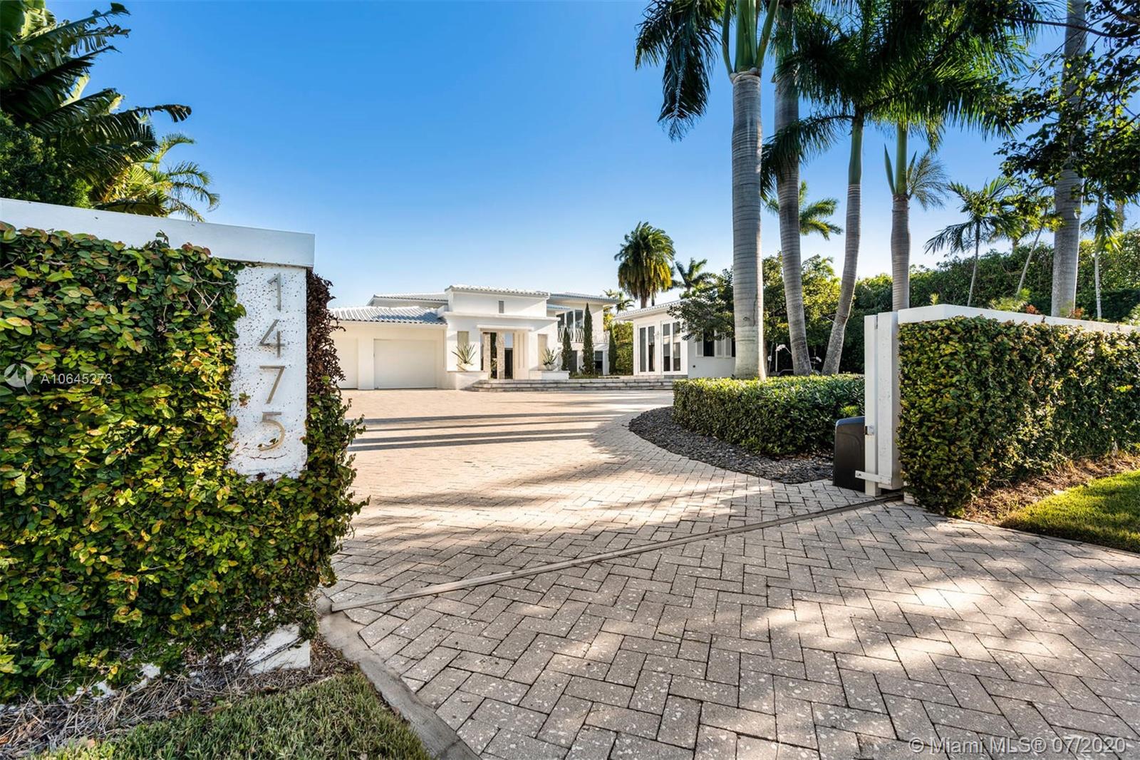 1475 North View Drive Miami Beach, FL 33140 - Photo 2 of 27 a view of a street with palm trees