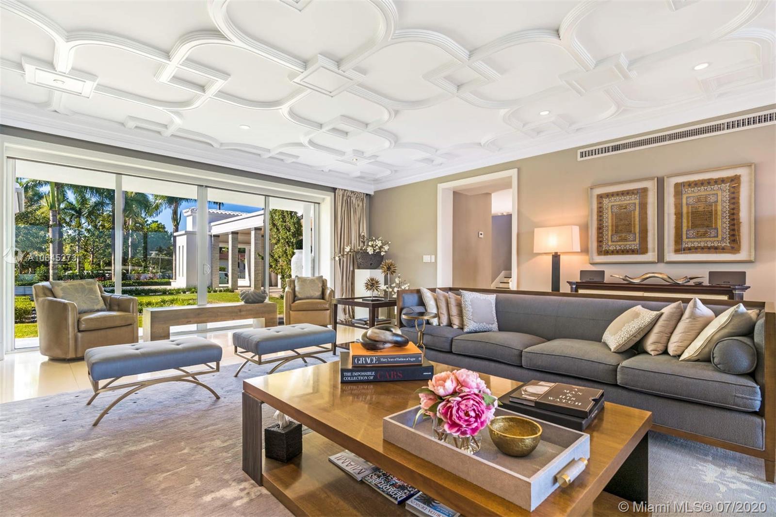 1475 North View Drive Miami Beach, FL 33140 - Photo 11 of 27 a living room with furniture and a large window