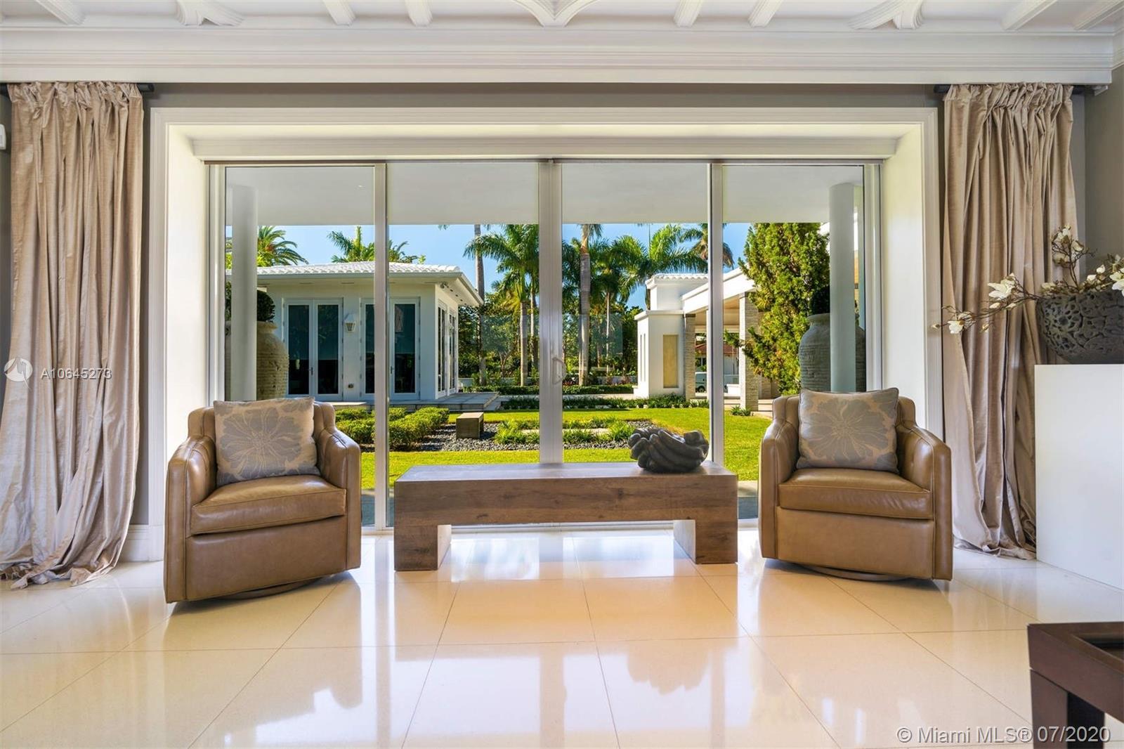 1475 North View Drive Miami Beach, FL 33140 - Photo 13 of 27 a living room with furniture and a large window
