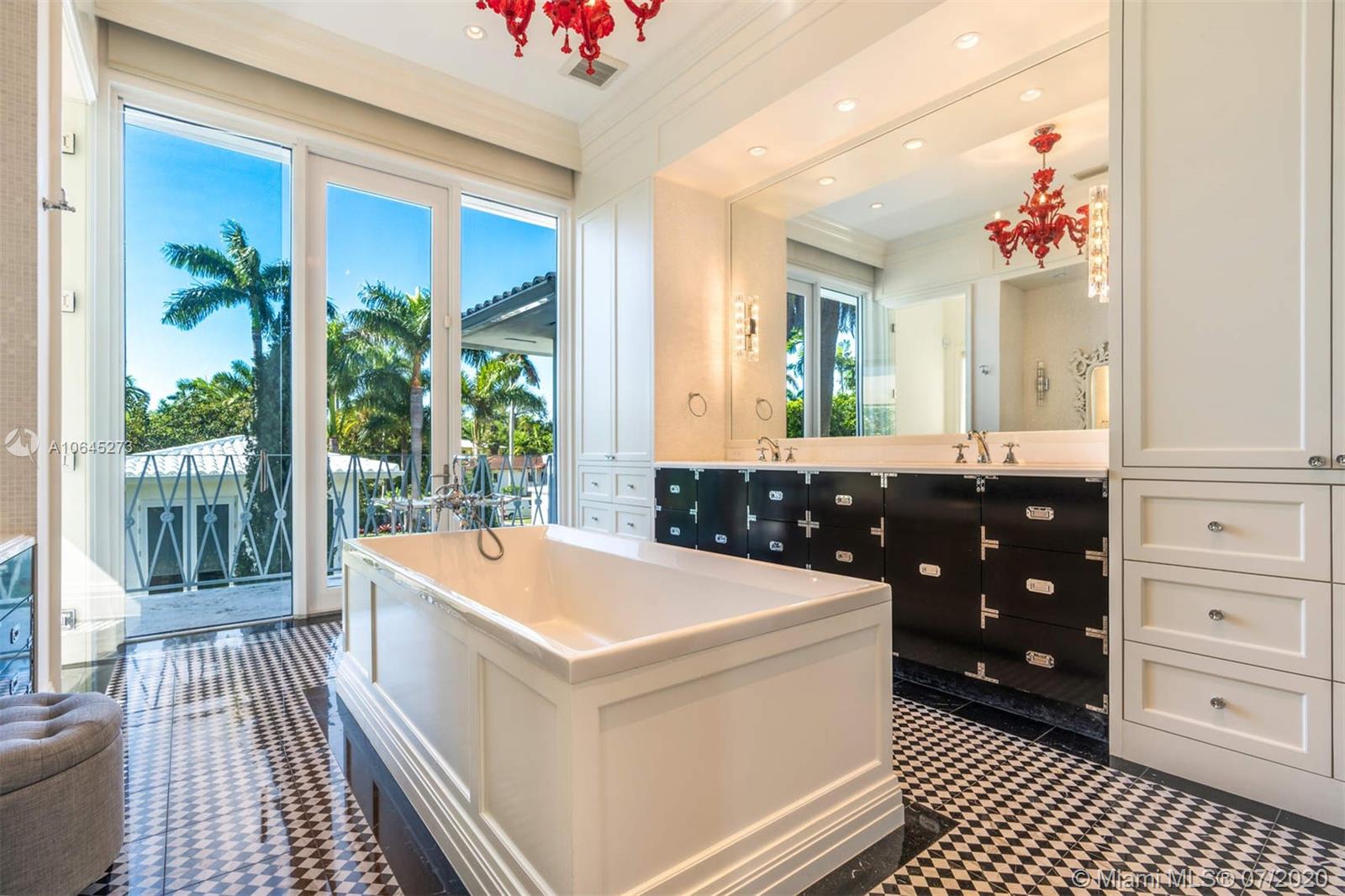 1475 North View Drive Miami Beach, FL 33140 - Photo 19 of 27 a very nice looking dining room with a large window