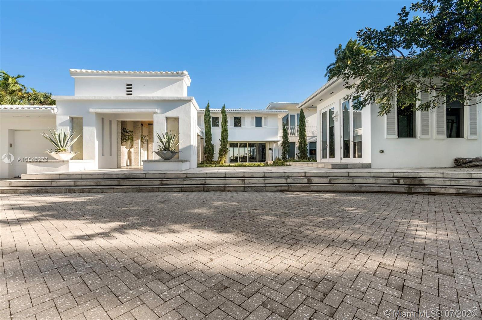 1475 North View Drive Miami Beach, FL 33140 - Photo 3 of 27 a view of a house with a yard