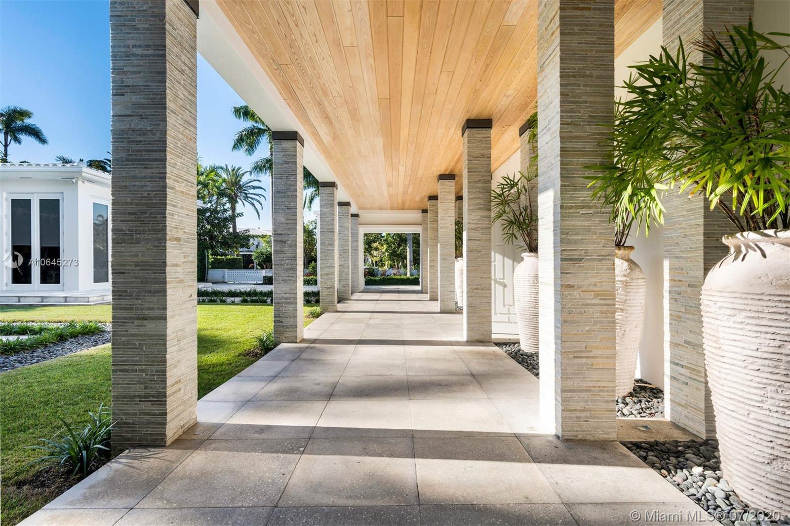 1475 North View Drive Miami Beach, FL 33140 - Photo 9 of 27 a view of a house with a swimming pool