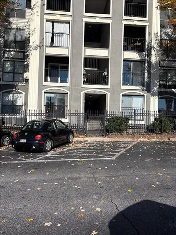 a car parked in front of a building