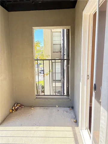 a view of front door with wooden floor