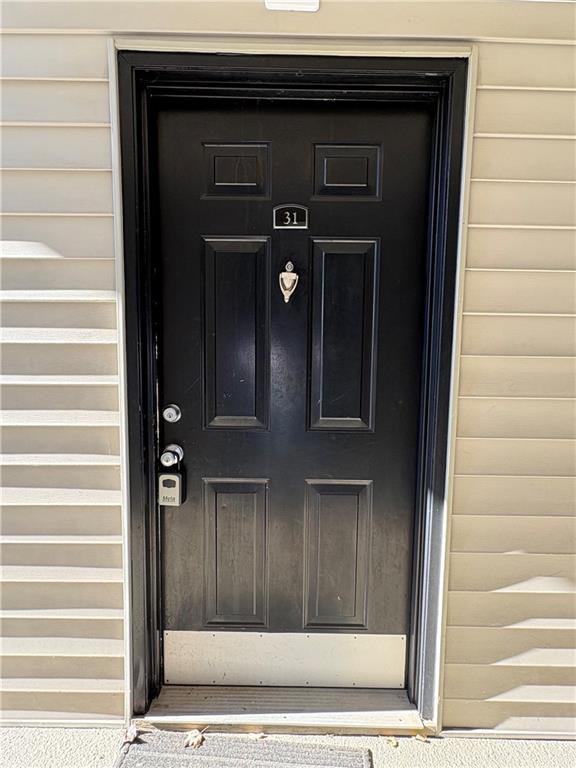 2657 Lenox Road Northeast, Unit 31 Atlanta, GA 30324 - Photo 2 of 18 a view of entrance door of the house