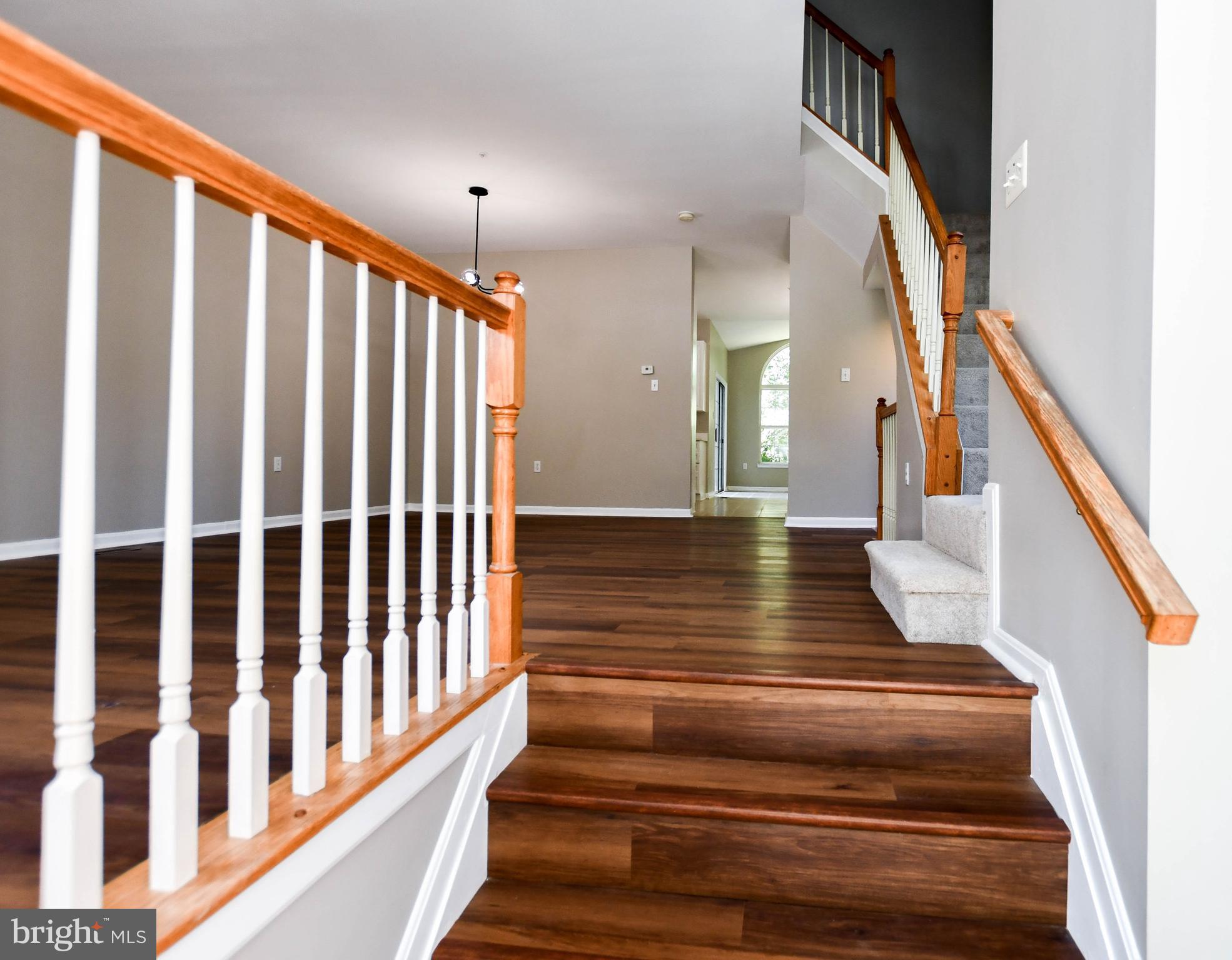 4308 Huntshire Road Randallstown, MD 21133 - Photo 11 of 40 a view of entryway and hall with wooden floor