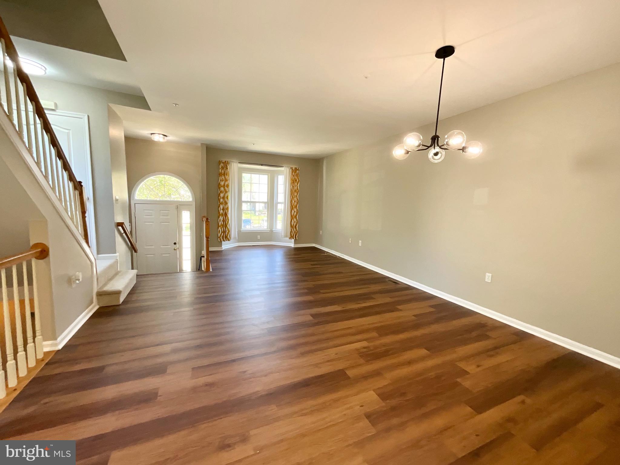 4308 Huntshire Road Randallstown, MD 21133 - Photo 15 of 40 a view of an entryway with wooden floor