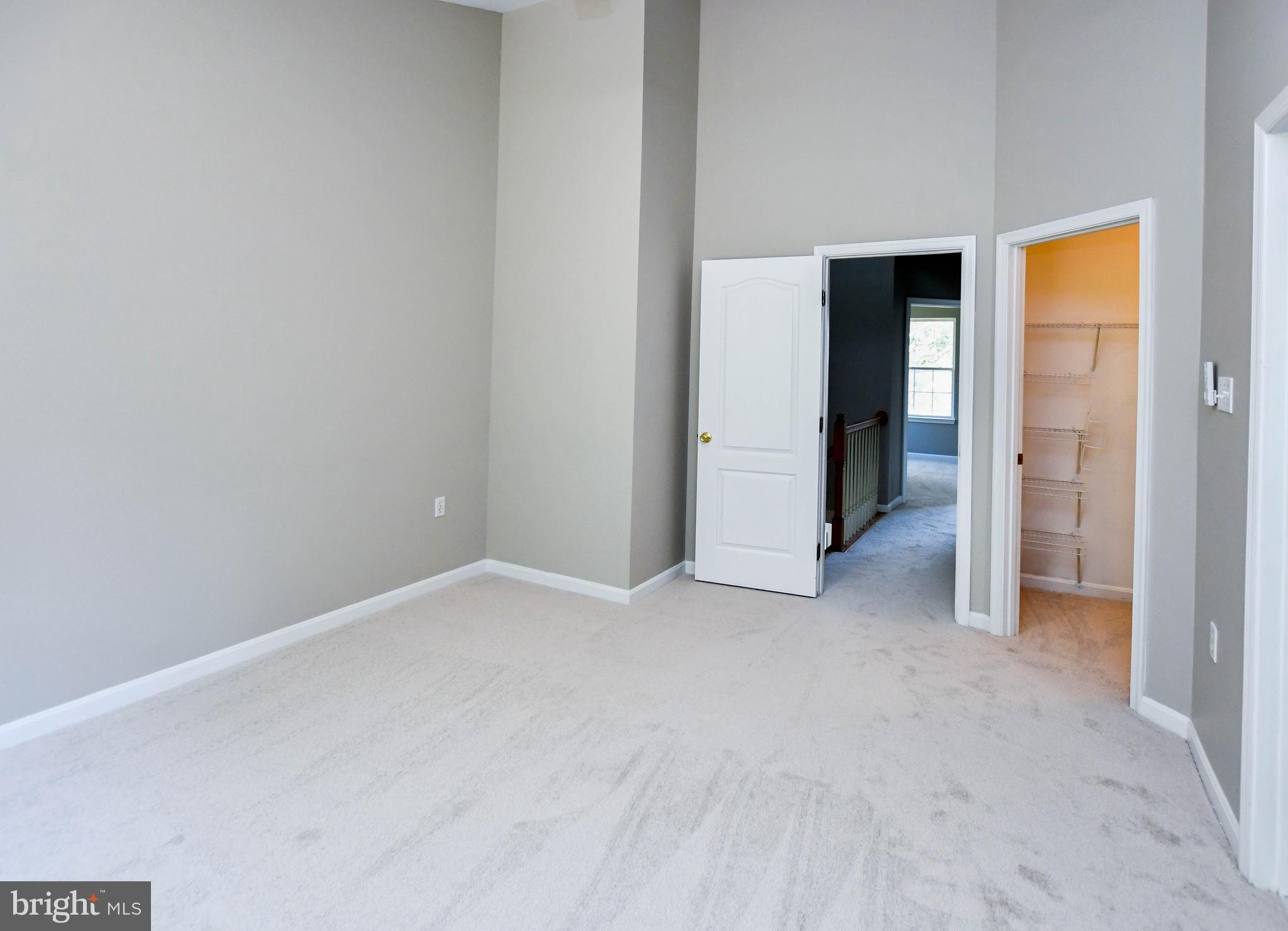 4308 Huntshire Road Randallstown, MD 21133 - Photo 21 of 40 an empty room with closet and bathroom