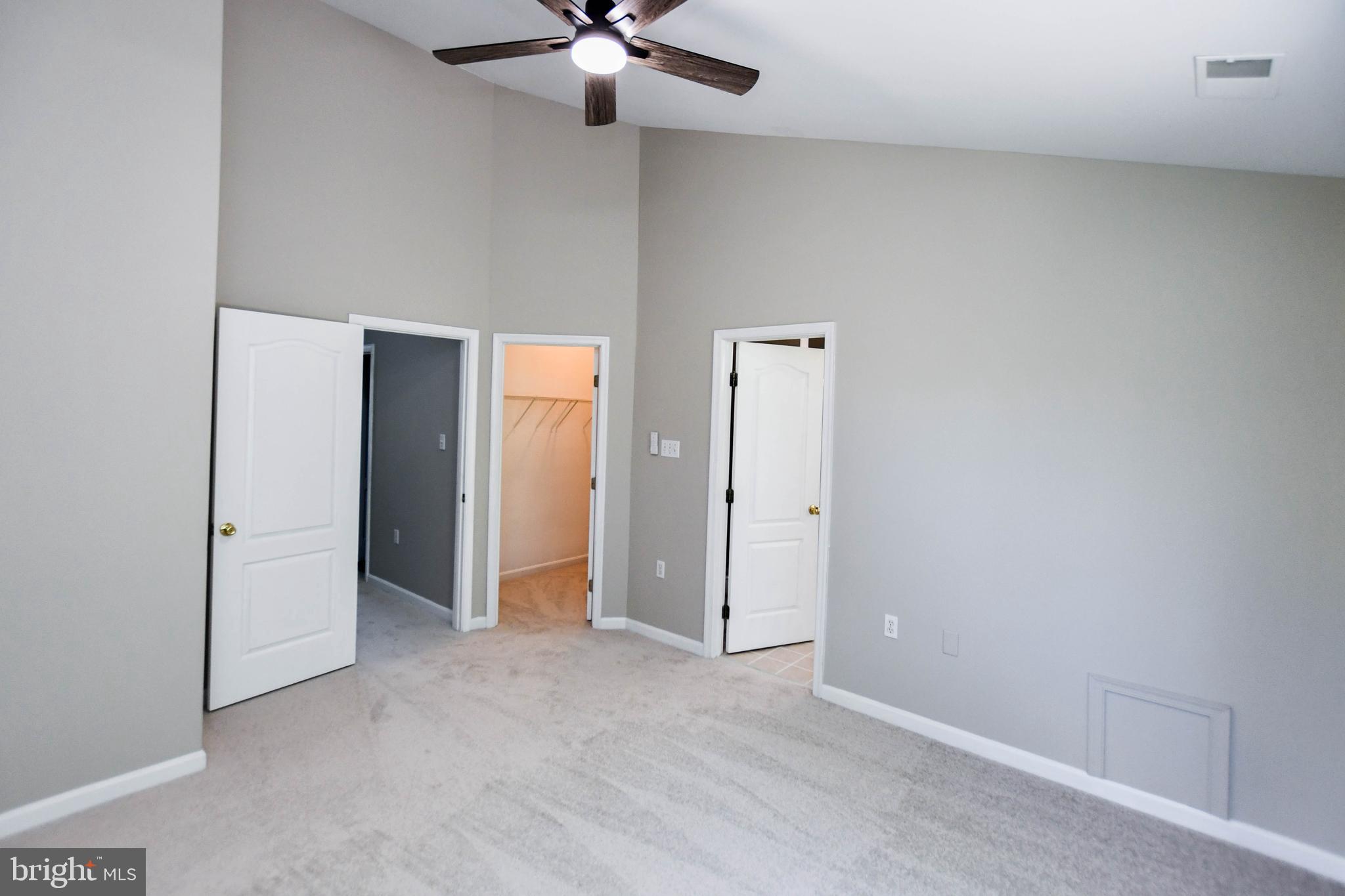 4308 Huntshire Road Randallstown, MD 21133 - Photo 22 of 40 an empty room with fan