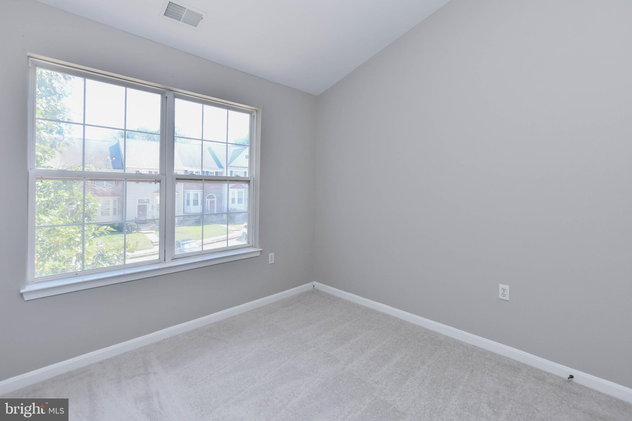 4308 Huntshire Road Randallstown, MD 21133 - Photo 30 of 40 an empty room with a window