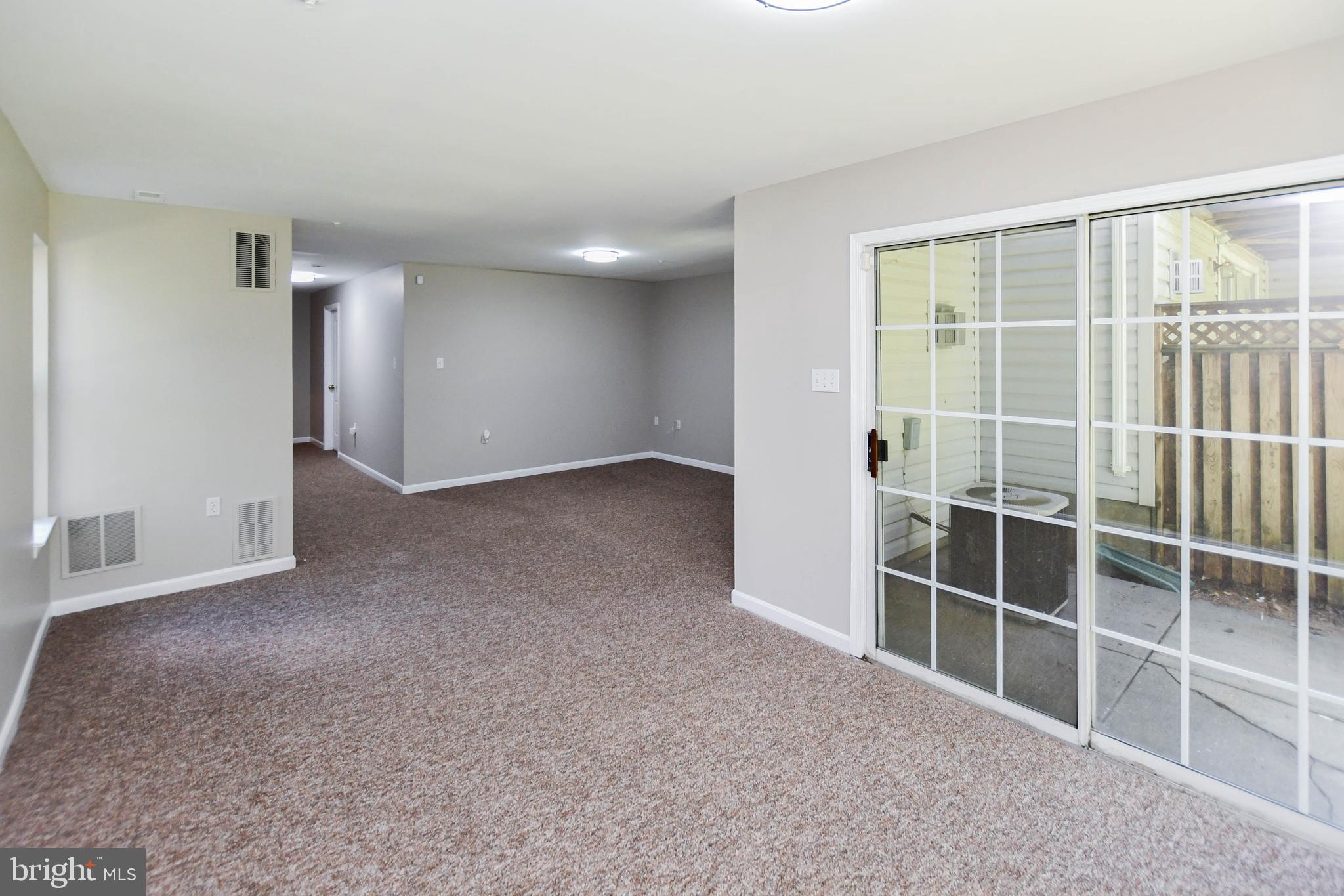 4308 Huntshire Road Randallstown, MD 21133 - Photo 38 of 40 a view of an empty room with a window