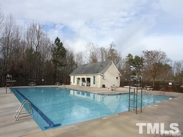 a view of a house with a yard porch and sitting area
