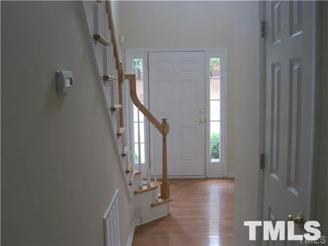 a view of entryway with livingroom and window