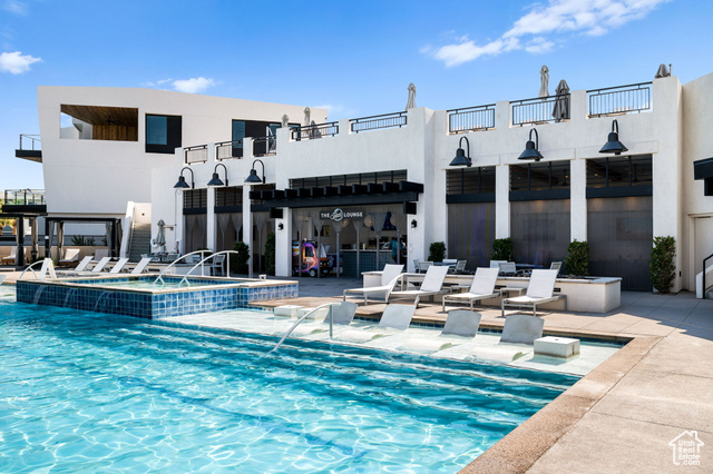 961 West Akoya Pearl Road, Unit 201 St. George, UT 84790 - Photo 54 of 67 View of swimming pool with a pool with connected hot tub