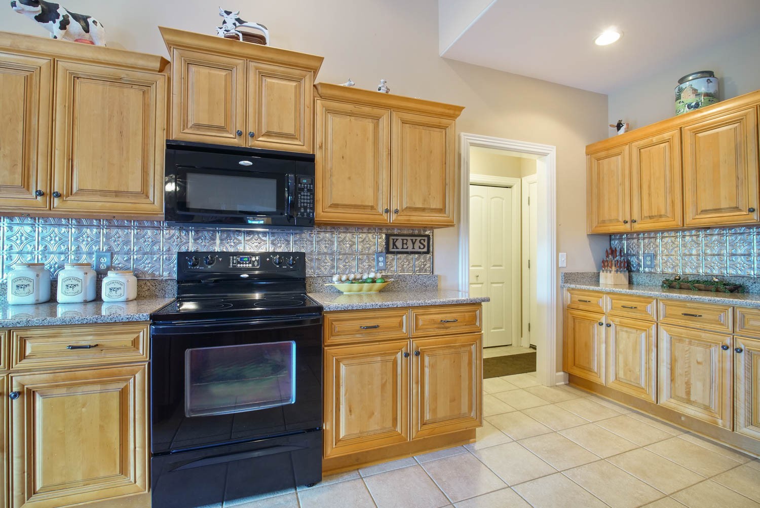 545 Sugar Flat Road Lebanon, TN 37087 - Photo 13 of 26 a kitchen with stainless steel appliances granite countertop a stove top oven a sink dishwasher and granite countertops