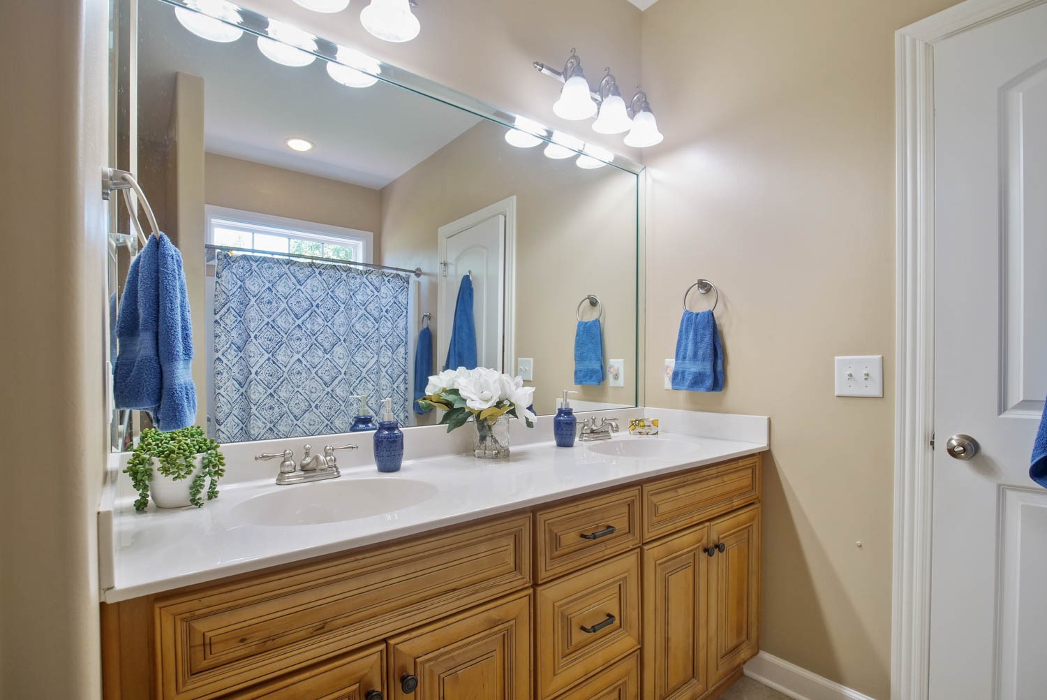 545 Sugar Flat Road Lebanon, TN 37087 - Photo 16 of 26 a bathroom with a sink double vanity and a mirror