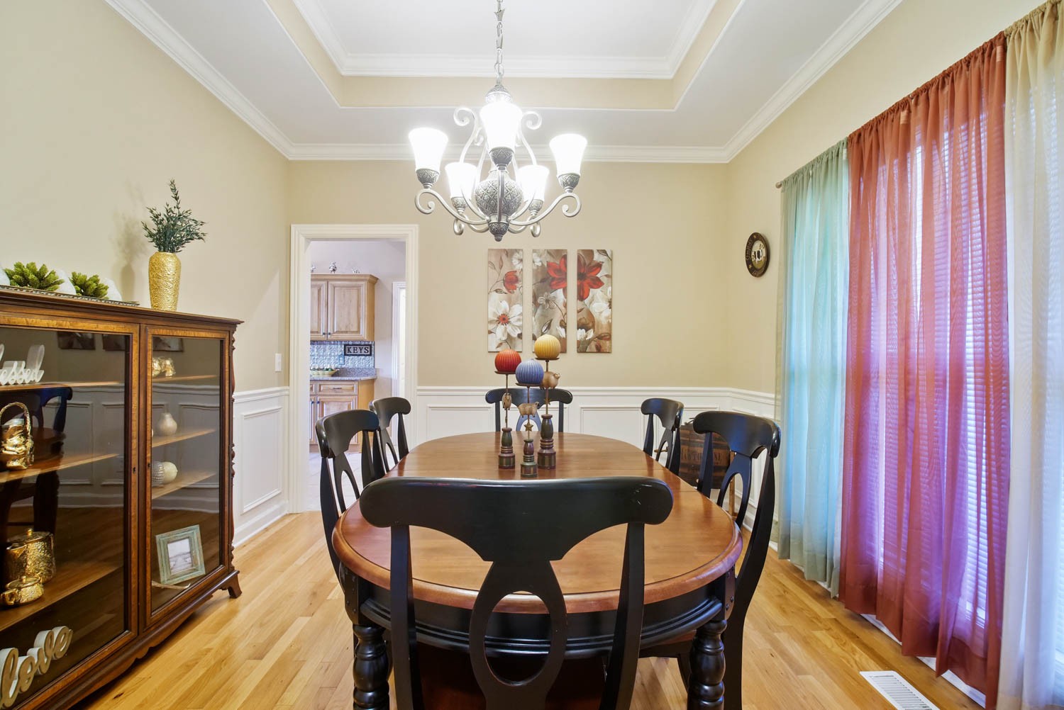 545 Sugar Flat Road Lebanon, TN 37087 - Photo 3 of 26 a view of a dining room with furniture and chandelier