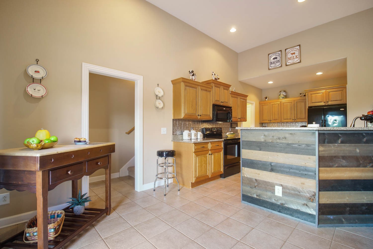 545 Sugar Flat Road Lebanon, TN 37087 - Photo 8 of 26 a kitchen with refrigerator and cabinets