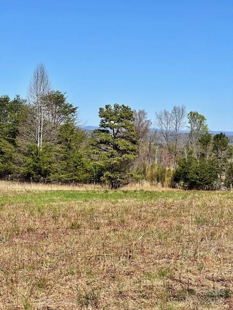 2 Lynn Mountain Road Vale, NC 28168 - Photo 11 of 13 a view of a field with an trees in the background